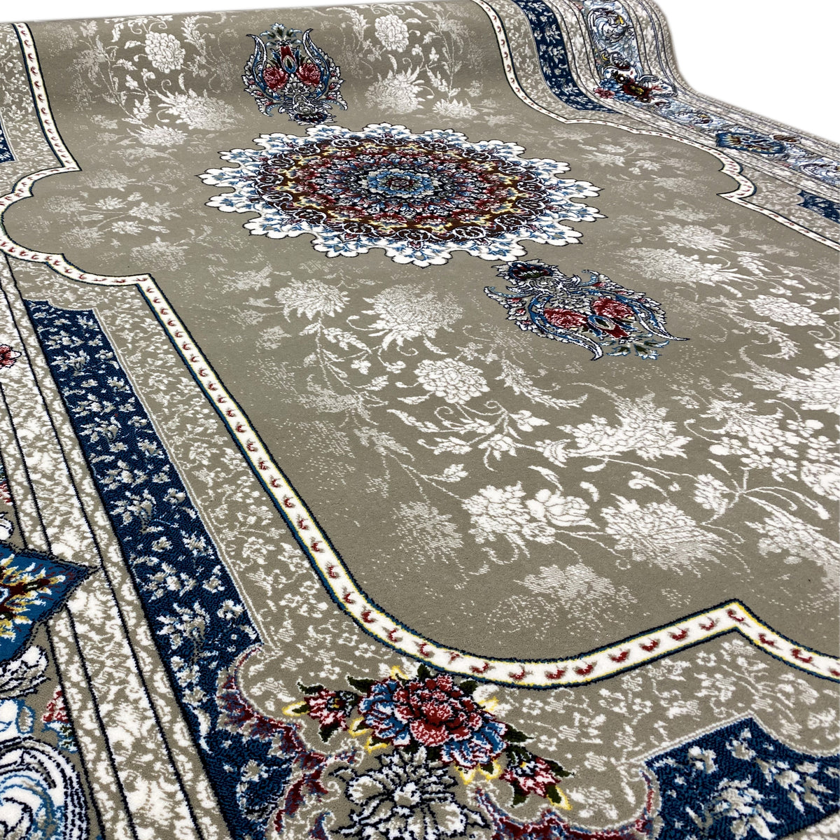 Beige rug with a blue medallion and colorful accents, floral ornaments