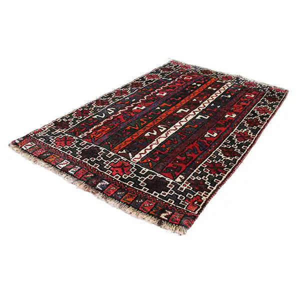 Oriental rug with a multicolored striped pattern and decorative border, dark red, blue, black
