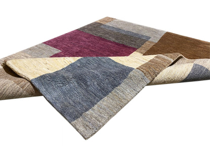 Gabbeh-Teppich mit aufgerolltem Rand, Patchwork-Blöcke in creme, blau, bordeaux und braun