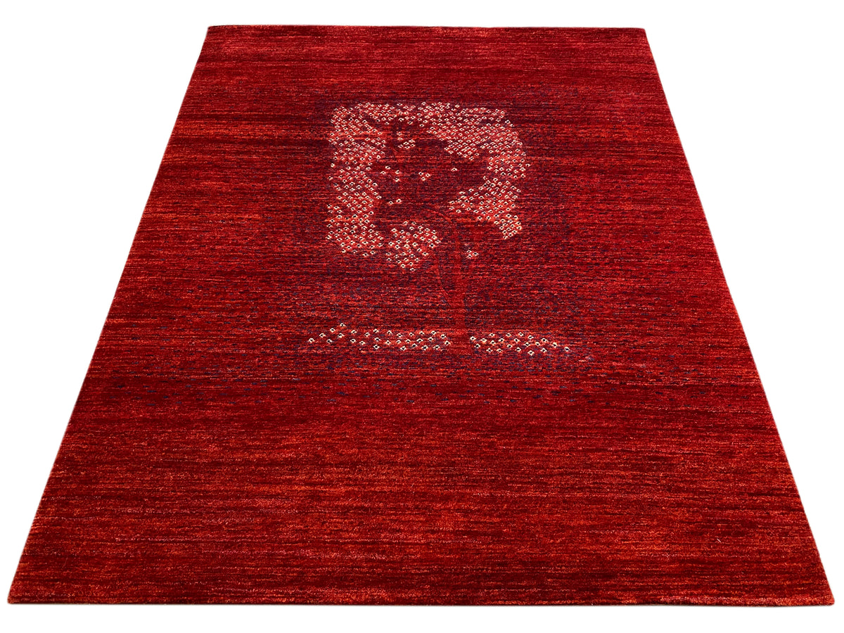 Red rug with a central medallion and a striped, all-over woven pattern