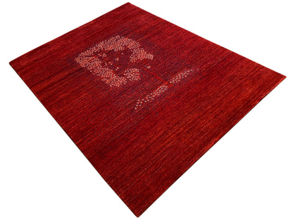 Red carpet, diamond-like view, with a medallion motif in a light dot pattern