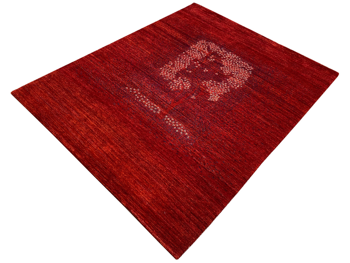 Red carpet with a diagonal perspective, central medallion, and delicate dot pattern