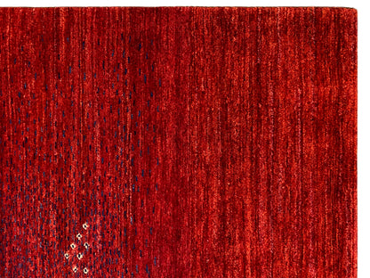 Red carpet close-up: dense pile with short fibers and an even surface