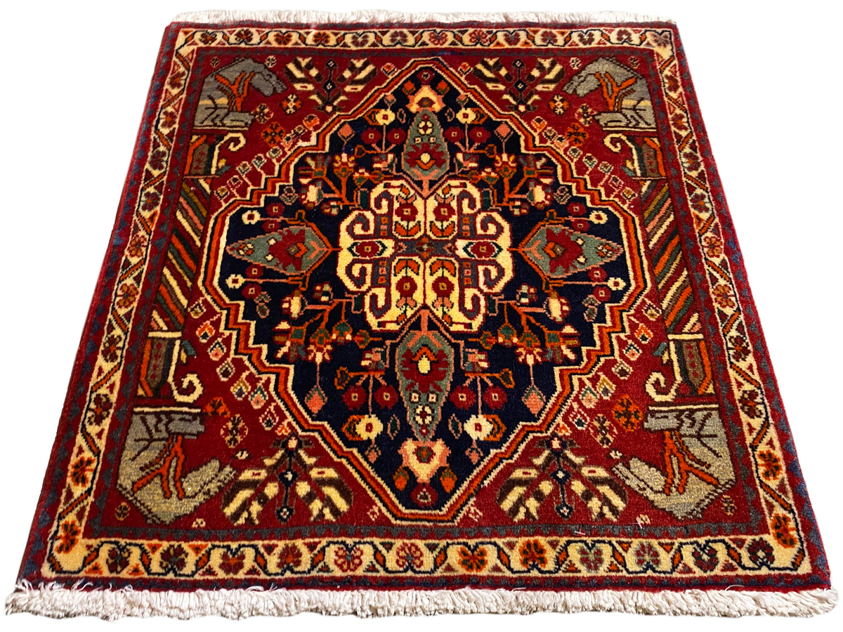 Carpet 65x59 cm in a square with multicolored ornaments and a surrounding border