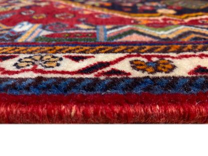 Poshti rug: fringed seam and selvedge with a color gradient from blue to red