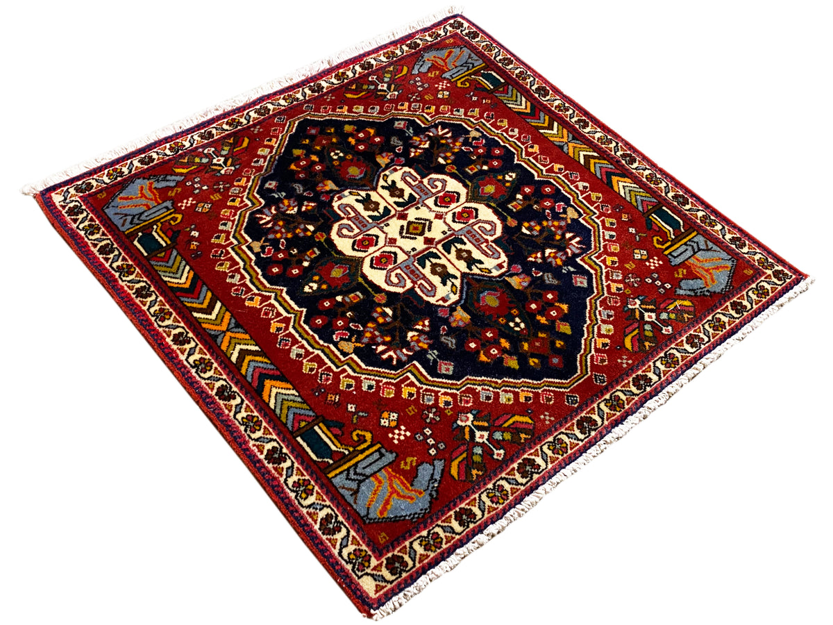 Poshti rug 65x61 cm, diagonal view: red background with dark blue center