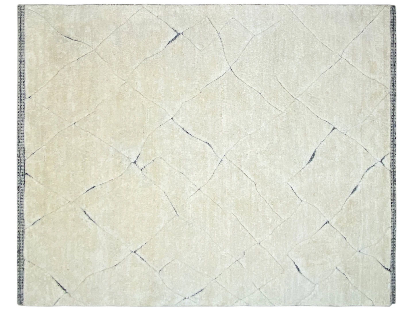 Strukturierter Wollteppich in Elfenbein für große Wohnräume