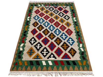 Ethno Kelim Teppich mehrfarbig mit grünem Rand 147x95 cm